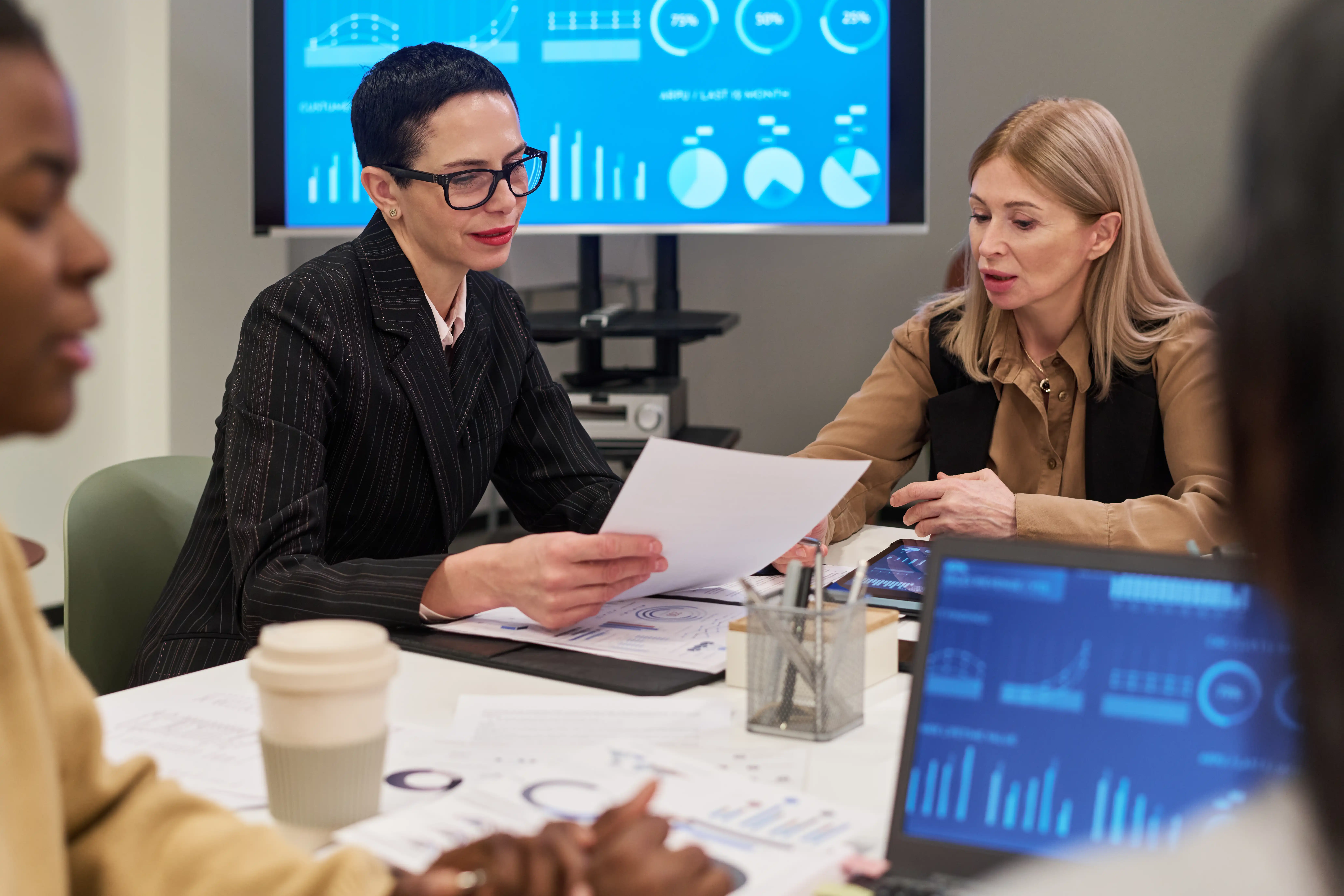Dynamics Monk real-time supply chain visibility meeting with data analytics, business intelligence dashboards, and economic value analysis.